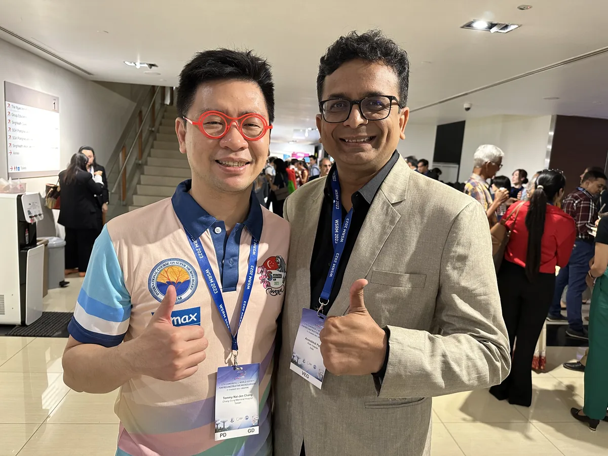 Dr. Arvind Patel with a colleague at an international plastic surgery congress